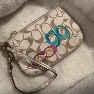 Coach Signature Wristlet with Pink and Teal Accents